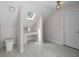 Bright bathroom features a modern toilet, skylight and a built in vanity at 11260 Houze Rd, Roswell, GA 30076