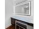 Vanity area features under-cabinet storage, a light countertop, and a large, bright LED mirror at 11260 Houze Rd, Roswell, GA 30076