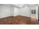 Bright and airy bedroom with hardwood floors and a door leading to outdoor area at 11260 Houze Rd, Roswell, GA 30076