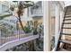 Multi-story interior courtyard with lush landscaping, creating a tranquil and bright living space at 11260 Houze Rd, Roswell, GA 30076