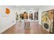 Beautiful foyer with hardwood floors, glass table and views into the interior atrium at 11260 Houze Rd, Roswell, GA 30076