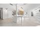 Open kitchen featuring a marble island with a breakfast bar and modern appliances at 11260 Houze Rd, Roswell, GA 30076