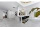 Spacious kitchen featuring an island with bar seating and an open layout at 11260 Houze Rd, Roswell, GA 30076