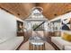 Expansive living room with wood-paneled ceilings and an open floor plan at 11260 Houze Rd, Roswell, GA 30076
