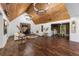 Bright living room featuring a fireplace, wood floors, and neutral tones at 11260 Houze Rd, Roswell, GA 30076