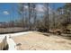 Spacious backyard featuring a storage shed and partial fencing for added privacy at 139 6Th St, Auburn, GA 30011