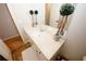 Well-lit bathroom featuring a white vanity with plenty of counter space and storage at 139 6Th St, Auburn, GA 30011