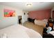 Well lit bedroom with two beds, desk, large mirror and plenty of storage at 139 6Th St, Auburn, GA 30011