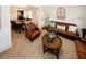 Open living room featuring brown leather couches that flow into the dining and kitchen areas at 139 6Th St, Auburn, GA 30011