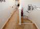 Carpeted staircase with decorative accents and white railings, leading to the upper level at 139 6Th St, Auburn, GA 30011