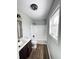 Cozy bathroom with sleek vanity, white fixtures, and a clean, modern aesthetic at 1154 Stone Mill Run, Lawrenceville, GA 30046