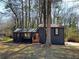 Charming home with updated exterior, front lawn, and inviting wood-stained entryway at 1154 Stone Mill Run, Lawrenceville, GA 30046