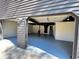 Spacious two-car garage featuring newly painted walls and floors at 1154 Stone Mill Run, Lawrenceville, GA 30046
