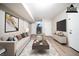 Staged basement with neutral walls and wood-look flooring at 8904 Creekwood Ct, Riverdale, GA 30274