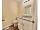 Neutral bathroom showcasing a granite countertop, white cabinetry, and new fixtures at 93 Mill Creek Rd, Hiram, GA 30141
