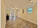 Spacious room featuring light walls, wood-style flooring, and natural light, creating a warm and inviting atmosphere at 93 Mill Creek Rd, Hiram, GA 30141
