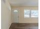 Inviting living room with modern hardwood floors and a bright, airy atmosphere from multiple windows at 158 Polar Rock Sw Dr, Atlanta, GA 30315
