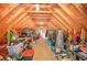 Spacious attic storage area with wood beam ceiling and ample room for organizing belongings at 1240 Evans Cook Rd, Canton, GA 30115