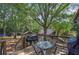 Inviting backyard view from the deck, featuring a shed and lush greenery perfect for outdoor gatherings at 1240 Evans Cook Rd, Canton, GA 30115