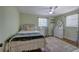 Bright bedroom with white furniture and a ceiling fan at 1240 Evans Cook Rd, Canton, GA 30115