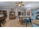 Open kitchen featuring an island, stainless steel appliances, light blue cabinetry, and hardwood floors at 1240 Evans Cook Rd, Canton, GA 30115