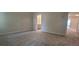 Spacious bedroom with plush carpet and a view of the en suite bathroom at 1393 Vayda Ct, Marietta, GA 30066