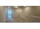 Second floor hallway with carpet and lots of light at 1393 Vayda Ct, Marietta, GA 30066