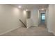 Upstairs hallway with plush carpeting leading to various rooms at 1393 Vayda Ct, Marietta, GA 30066