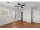 Bedroom featuring hardwood floors, ceiling fan, closet and an ensuite bathroom at 1937 Joseph Ct, Decatur, GA 30032