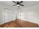 Bedroom with hardwood flooring, closet, ceiling fan and a double door closet at 1937 Joseph Ct, Decatur, GA 30032