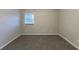 Bedroom with neutral carpet and walls at 2303 Pinewood Dr, Decatur, GA 30032