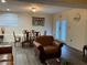 Finished basement with a dining area, seating, and natural light, perfect for entertaining or relaxing at 3630 High Point Sw Ln, Atlanta, GA 30331