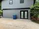 Exterior view of home with access to basement and private drive at 3630 High Point Sw Ln, Atlanta, GA 30331