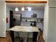 Spacious kitchen featuring an island, modern appliances, and ample cabinet storage at 3630 High Point Sw Ln, Atlanta, GA 30331