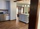 Open kitchen area with island, seamlessly connecting to the living spaces for easy entertaining at 3630 High Point Sw Ln, Atlanta, GA 30331