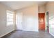 This bedroom features wood floors, a window, and two closets for storage at 546 W Sherwood Dr, Riverdale, GA 30274