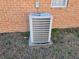 Exterior image of an air conditioner unit on a concrete slab at 634 S Jeff Davis S Dr, Fayetteville, GA 30215