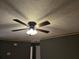 A ceiling fan with lights and decorative ceiling at 634 S Jeff Davis S Dr, Fayetteville, GA 30215