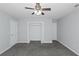 Bedroom with plush carpets, neutral walls and a closet at 1458 Walnut Log Pl, Austell, GA 30168