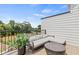 Relax on this beautiful balcony with comfortable seating and peaceful outdoor views at 2537 Astaire Ct, Atlanta, GA 30318