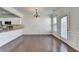 Dining area featuring hardwood floors and kitchen access at 1062 Haley Woods Ct, Lawrenceville, GA 30043