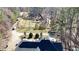 A spacious, single-Gathering home situated on a sprawling lot with mature trees and a long driveway at 210 Cowan Se Rd, Conyers, GA 30094