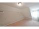 Bedroom featuring neutral walls, carpet flooring, and a window to the exterior at 210 Cowan Se Rd, Conyers, GA 30094