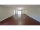 Spacious living room with wood floors and sliding glass doors to the exterior at 210 Cowan Se Rd, Conyers, GA 30094