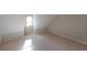 Bedroom featuring carpeted floors and natural light at 210 Cowan Se Rd, Conyers, GA 30094