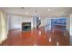 Spacious living room with fireplace, staircase, and mountain mural at 210 Cowan Se Rd, Conyers, GA 30094