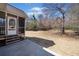 Back porch looking out to the private backyard at 303 Wood Wind Dr, Woodstock, GA 30189