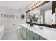 Bathroom with lots of natural light and double sinks at 6909 Island Pointe Dr, Buford, GA 30518