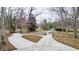 Long driveway surrounded by mature trees, leading up to the home at 955 Mary Ellen Lane Ln, Austell, GA 30168