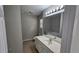 Bathroom featuring vanity with a large mirror and a tiled floor at 115 Sunset Ln, Woodstock, GA 30189